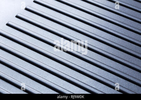 Abstrakte diagonal gestreiften Hintergrund Farbverlauf von modernen High-tech-Werkstoff. Stockfoto