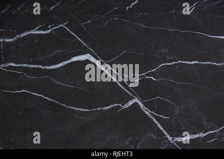 Natürliche Marmor ist ein schwarzer Stein mit weissen Streifen namens Nero Marquina. Stockfoto