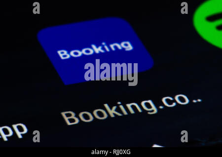 Booking.com app, travel Fahrpreis aggregator Website und Reisen Metasuchmaschine für Reservierungen und Unterkünfte, Hotel und zu Hause bleiben Stockfoto