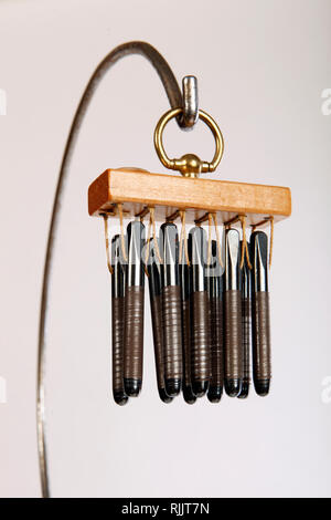 Authentischer Piano Pins, schrillen Windspiele aus Stahl. Stockfoto