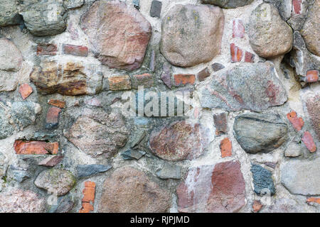 Die Steine sind in einem chaotischen Reihenfolge angeordnet sind und eine Textur Stockfoto