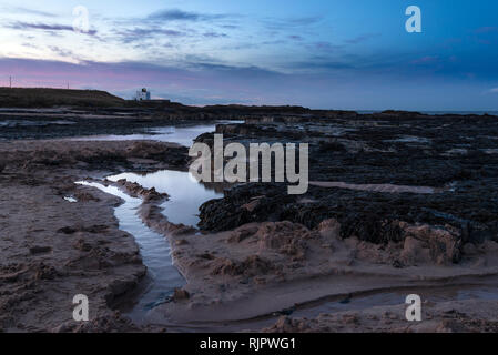 Bamburgh Castle & Strand Stockfoto