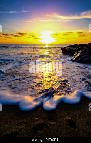 Küsten Sonnenauf- und -untergänge in Wales Stockfoto