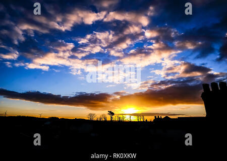 Küsten Sonnenauf- und -untergänge in Wales Stockfoto