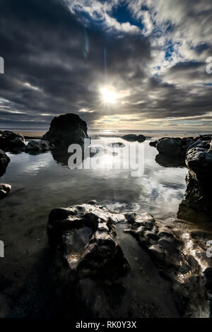 Küsten Sonnenauf- und -untergänge in Wales Stockfoto