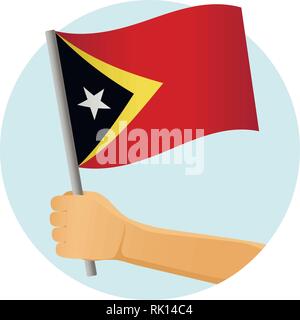 Osttimor Flagge in der Hand. Patriotischen Hintergrund. Nationalflagge von Osttimor Vector Illustration Stock Vektor