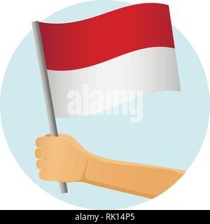 Monaco Flagge in der Hand. Patriotischen Hintergrund. Nationalflagge von Monaco Vector Illustration Stock Vektor