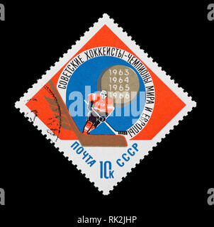Briefmarke aus der Sowjetunion, das eine Ice Hockey Player, für den sowjetischen Sieg in der Welt Eishockey WM in 1966. Stockfoto