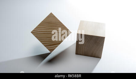 Abstrakte geometrische echten Holzwürfel auf weißem Hintergrund und es ist nicht 3D-Render. Stockfoto