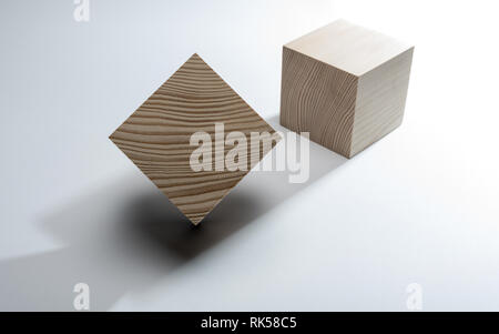Abstrakte geometrische echten Holzwürfel auf weißem Hintergrund und es ist nicht 3D-Render. Stockfoto