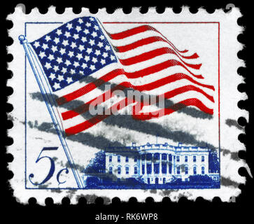 USA - ca. 1963: einen Stempel in den USA gedruckten zeigt die Flagge über uns White House, ca. 1963 Stockfoto