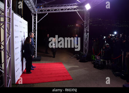 Melissa McCarthy und Richard E. Zuschuss an die Nespresso British Academy Film Awards nominierten' Party im Kensington Palace, London. Stockfoto