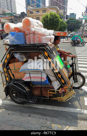 Manila, Philippines-October 24, 2016: Pedicabs sind der einfachste Weg um rund um den Binondo District-Chinatown Bereich. Dieser gestoppt bei Q. Paredes Stockfoto