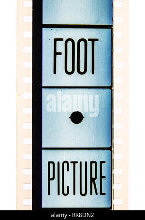 Extreme Nahaufnahme der 35mm Film Filmstreifen mit Fuß und pixcture Sms Stockfoto