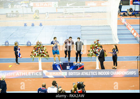 Birmingham, Großbritannien. 9. Februar 2019, spar Meisterschaften kugelstoßen Gewinner Lincoin gewinnt Gold Scott, Youcef gewinnt Silber, Samuel Heawood gewinnt Bronze bei Spar Britische Athletik Indoor Championships in Birmingham, England. Credit: Paul Saripo/Alamy Live News Credit: Paul Saripo/Alamy leben Nachrichten Stockfoto