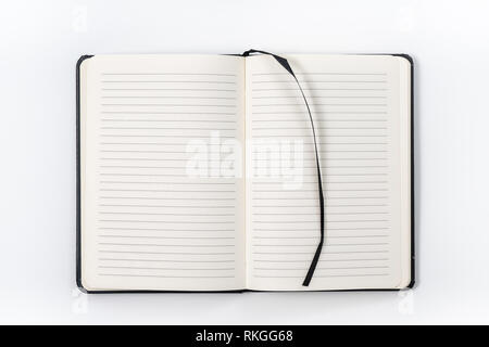 Notebook schwarz auf weißem Hintergrund mit Freistellungspfad Stockfoto