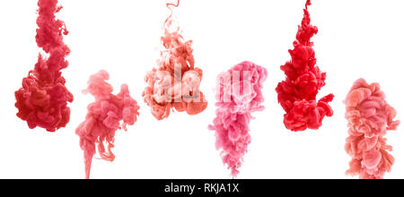 Set aus bunten Tinte auf weißem Hintergrund. Rot, Rosa, Koralle Tropfen wirbelnden unter Wasser. Wolke von Tinte in Wasser. Stockfoto