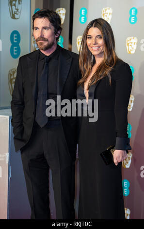 Christian Bale und Sibi Blazic besucht die EE British Academy Film Awards in der Royal Albert Hall, London. Stockfoto