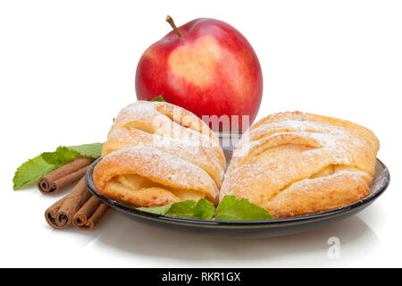 Apfel und Zimt und Minze Brötchen auf Teller. Stockfoto