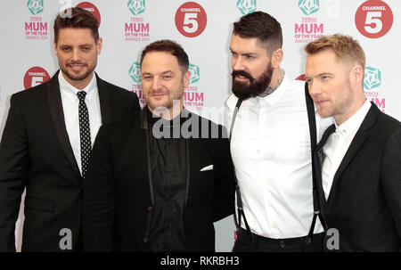 Keith Duffy, Mikey Graham, Shane Lynch und Ronan Keating von Boyzone nehmen an der Tesco Mama des Jahres Auszeichnungen im Savoy Hotel Stockfoto