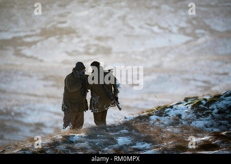 Pirsch im verschneiten Lake District National Park. Stockfoto