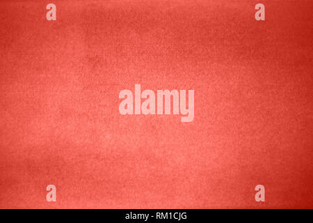 Konkrete Oberfläche in einem modischen Pantone Trendfarbe des Jahres 2019 Lebende Korallen als Hintergrund für creavity. Stockfoto