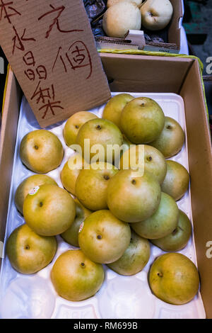 Äpfel auf einem Markt in Hong Kong Stockfoto