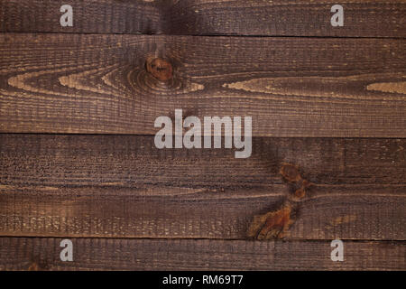 In der Nähe von dunklen rustikalen Wand aus alten Holztisch Planken Textur. Rustikale braun Holz Tisch Textur Hintergrund Vorlage für Ihr Design. Stockfoto