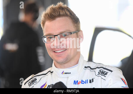 Phillip Island, Victoria, Australien. 14 Feb, 2019. Australische Super Autos Test Tag; Jack Perkins Lächeln vor der Fahrt mit dem walkinshaw Andretti United Holden Commodore ZB während der2019 Supercars test Tag Credit: Aktion plus Sport/Alamy leben Nachrichten Stockfoto