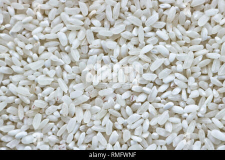 Die Textur der rundkörnigem Reis. Reis Grütze. Stockfoto