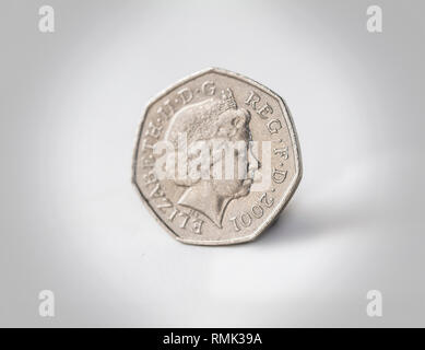 Naira und Pfund Münzen Stockfoto
