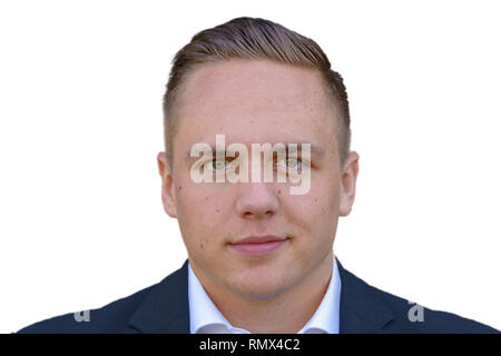 Smart junge Unternehmer mit einem ruhigen zuversichtlich, freundliches Lächeln vor weißem Hintergrund Stockfoto