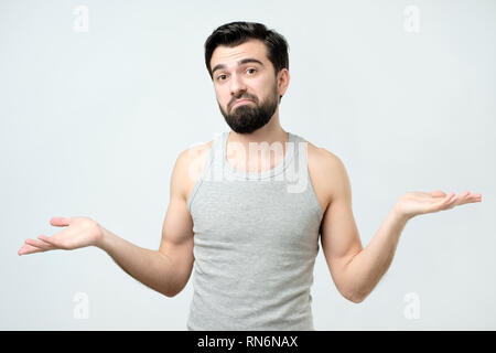 Hispanic, Ich habe keine Idee, Geste, zuckte mit den Schultern und Händen Stockfoto