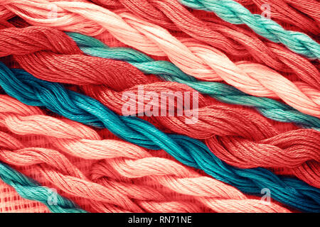 Hintergrund-threads für Stickerei closeup. Toning in der Farbe der lebende Korallen Stockfoto