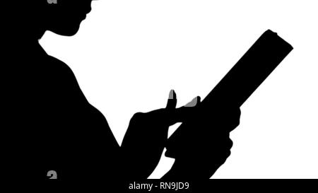 Silhouette weibliche Hände mit Tablet. Stockfoto
