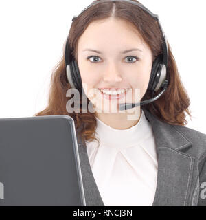 Portrait von lächelnden Customer Support weiblichen Telefon Arbeiter, gegen grauen Hintergrund. Beratung und Hilfe Service Call Center. Stockfoto