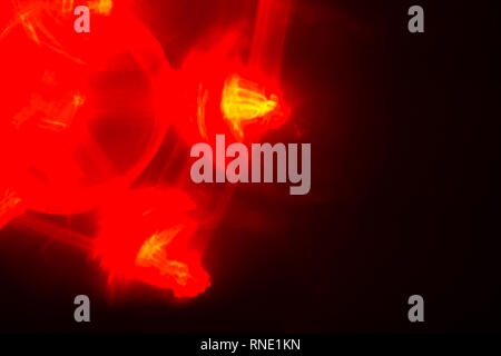 Lens Flare abstrakte Licht. Optische abstract Flash. soft Defokussierten verwischen. roter Hintergrund Stockfoto