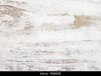 Grunge Hintergrund. Abblätternde Farbe an einem alten Holztisch. Holz Textur für weissen Hintergrund. Ansicht von oben. Stockfoto