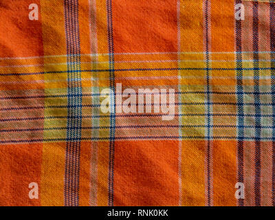 Orange und gelb karierte Drucken als Hintergrund. Scottish tartan Muster. Symmetrische rhombus Muster. Stockfoto