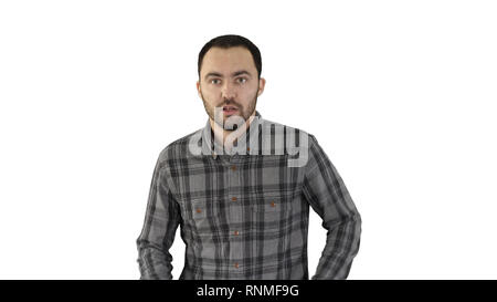 Junge Mann laufen und lächelnd auf weißem Hintergrund. Stockfoto