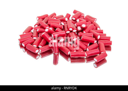 Bunte Bonbons auf einem Spiegel und einem weißem Hintergrund Stockfoto