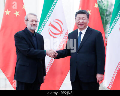 (190220) - Peking, Februar 20, 2019 (Xinhua) - der chinesische Präsident Xi Jinping (R) trifft sich mit Besuch der iranische Parlamentspräsident Ali Laridschani in der Großen Halle des Volkes in Peking, der Hauptstadt von China, Februar 20, 2019. (Xinhua / Yao Dawei) Stockfoto