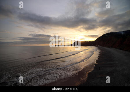 Sonnenuntergang am Strand von Sidmouth Stockfoto