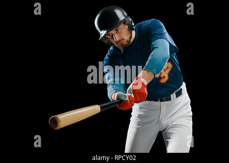 Hölzerne Fledermaus in den Händen des hitter Stockfoto