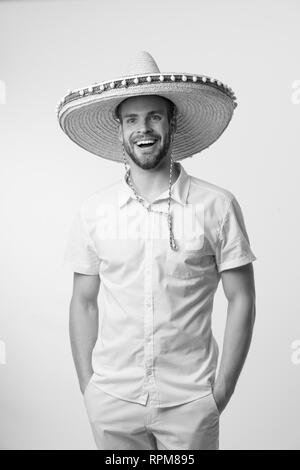 Glückliche Menschen Lächeln in sombrero Hut auf weißem Hintergrund, Mode. Immer gut drauf. Mexikanischen Stil. Travel Concept. Schön und stilvoll. Vertrauen und Charisma, Schwarz und Weiß. Stockfoto