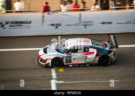 Hong Kong superstar Aaron Kwok fahren im 2013 Audi R8 LMS Schale an der Shanghai Circuit. Stockfoto