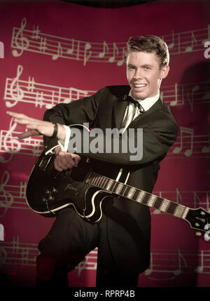 PETER KRAUS, Rock'n'Roll-Sänger, mit Gitarre, 50er Jahre. Studioaufnahme. Kpa/Grimm Stockfoto