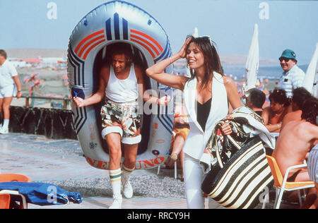 ZÄRTLICHE CHAOTEN-Szene mit Ricky (Thomas Gottschalk) und Sandy (DEBORAH SHELTON). Regie: Franz Josef Gottlieb/Überschrift: ZÄRTLICHE CHAOTEN/BRD 1987 Stockfoto