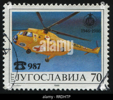 Russland KALININGRAD, 12. NOVEMBER 2016: Briefmarke von Jugoslawien gedruckt, zeigt, Helikopter, ca. 1986 Stockfoto