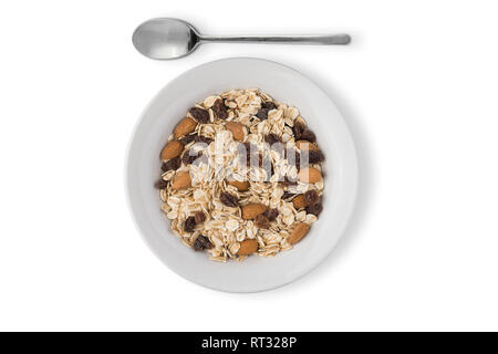 Weiße Platte mit Haferflocken auf weißem Hintergrund Stockfoto